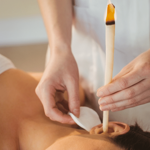the hopi ear candle treatment being performed in chesterfield